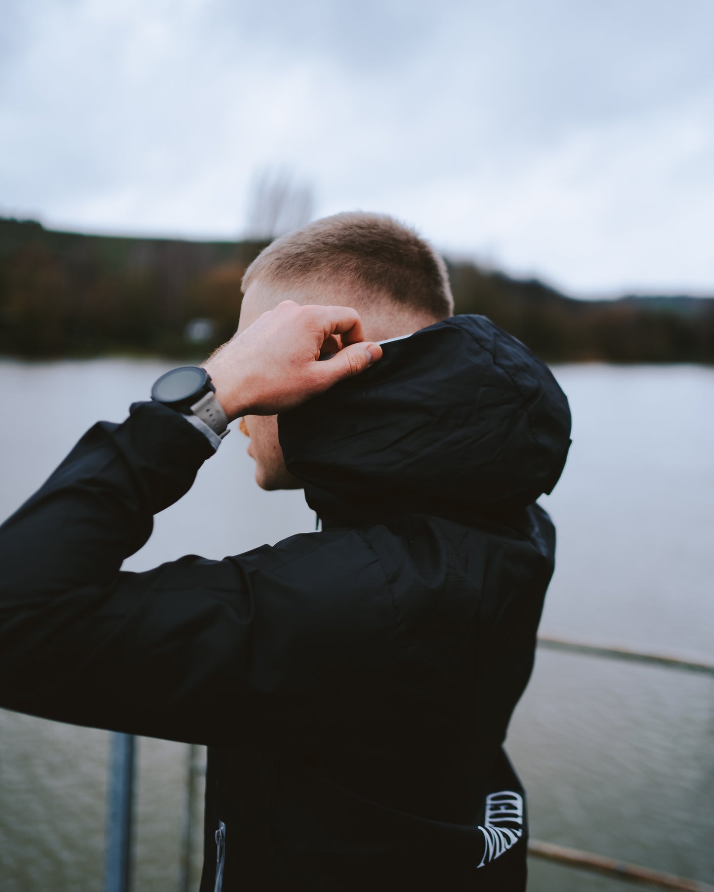 BLACK WINDBREAKER WITH HOOD